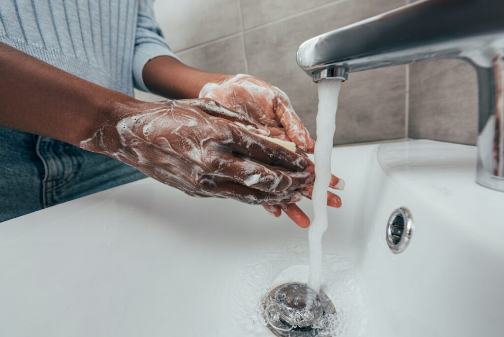 person washing their hands